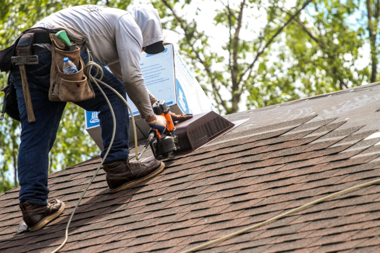 Roofers working on the new roof.