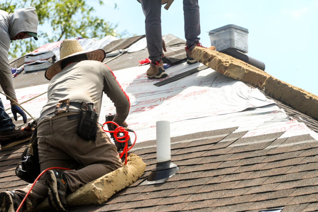 Roofers working on the new roof.